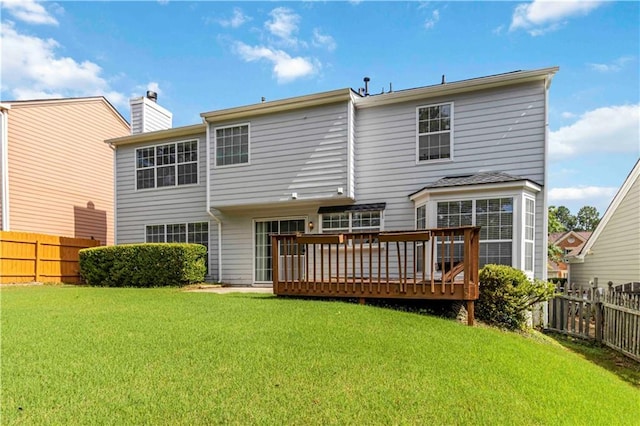 11885 Carriage Park Ln, Duluth, GA 30097 - back of property featuring a fenced backyard, a deck, and a chimney