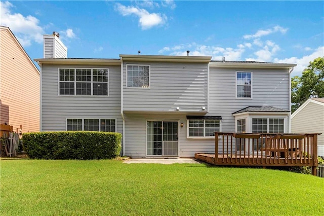 11885 Carriage Park Ln, Duluth, GA 30097 - back of property featuring a chimney, a yard, and a deck