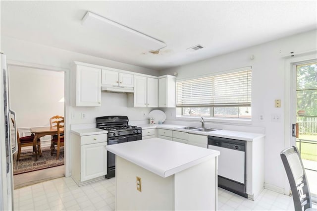 11885 Carriage Park Ln, Duluth, GA 30097 - kitchen featuring black range with gas cooktop, dishwasher, light countertops, white cabinets, and under cabinet range hood