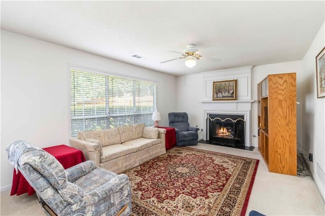 11885 Carriage Park Ln, Duluth, GA 30097 - carpeted living area with a fireplace with flush hearth and ceiling fan