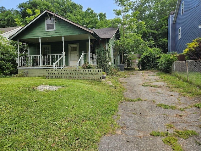 658 Schuyler Ave SE, Atlanta, GA 30312 - bungalow with a porch, driveway, and central air condition unit