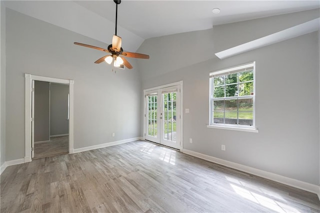 empty room featuring ceiling fan, wood finished floors, and baseboards