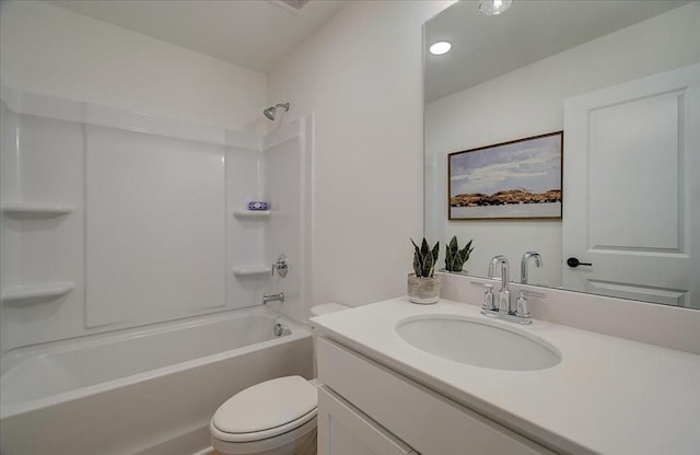 full bathroom featuring vanity,  shower combination, and toilet