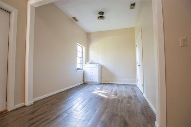 interior space with dark hardwood / wood-style flooring