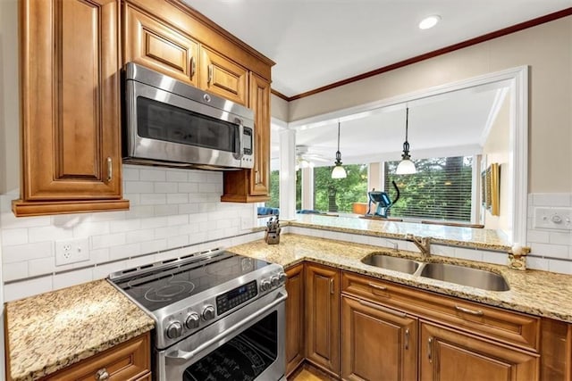 30 Chaumont Sq NW, Atlanta, GA 30327 - kitchen featuring appliances with stainless steel finishes, brown cabinets, ornamental molding, and light stone counters