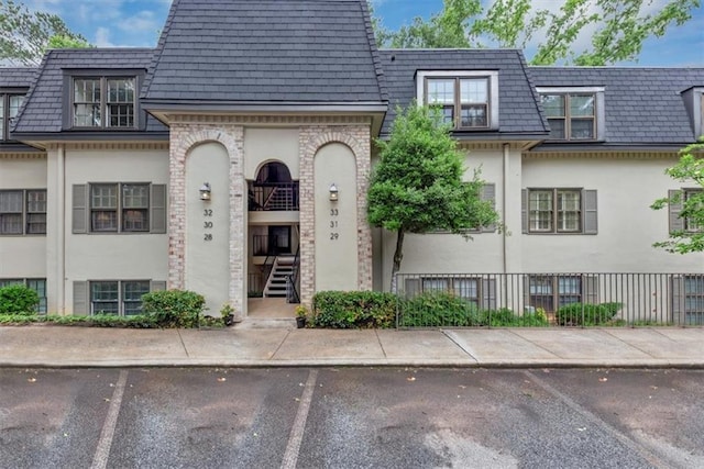 30 Chaumont Sq NW, Atlanta, GA 30327 - view of property featuring uncovered parking