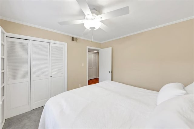 30 Chaumont Sq NW, Atlanta, GA 30327 - carpeted bedroom featuring a closet, ornamental molding, and ceiling fan