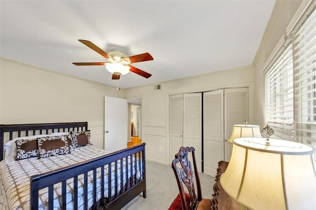 30 Chaumont Sq NW, Atlanta, GA 30327 - bedroom featuring carpet, a closet, a ceiling fan, and ornamental molding