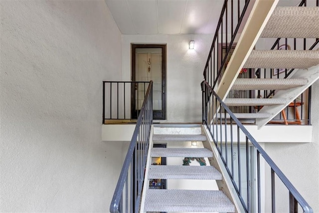 30 Chaumont Sq NW, Atlanta, GA 30327 - stairs with a textured wall