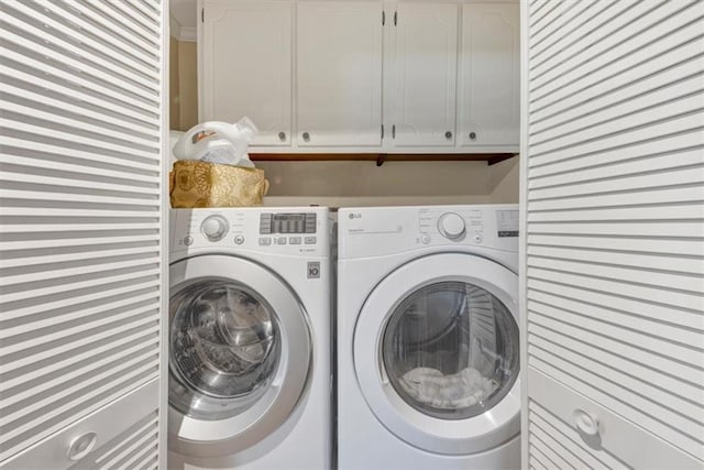 30 Chaumont Sq NW, Atlanta, GA 30327 - washroom with cabinet space and washing machine and clothes dryer
