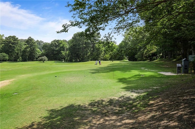 30 Chaumont Sq NW, Atlanta, GA 30327 - surrounding community featuring view of golf course, view of scattered trees, and a yard