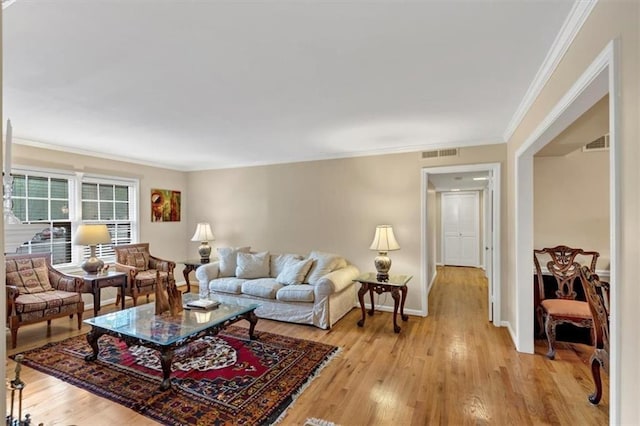 30 Chaumont Sq NW, Atlanta, GA 30327 - living room featuring light wood-style floors and ornamental molding