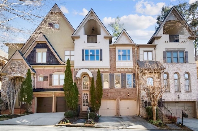 townhome / multi-family property featuring a garage