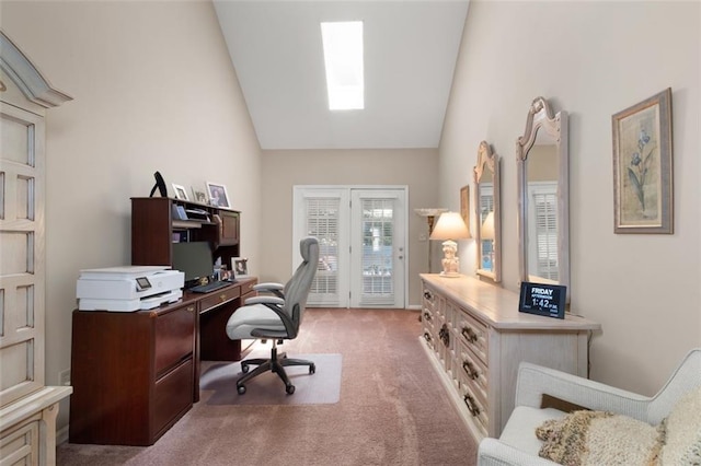 carpeted office with lofted ceiling