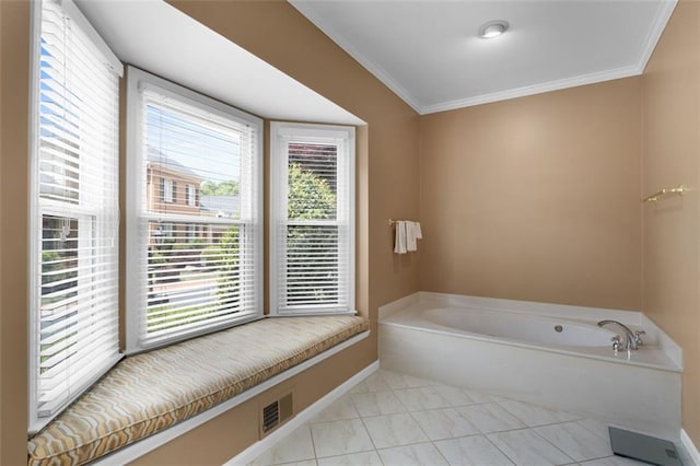bathroom featuring a garden tub, ornamental molding, and baseboards