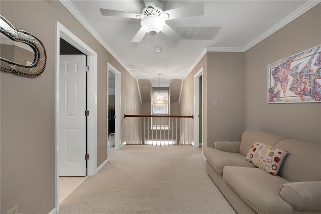hallway featuring carpet, ornamental molding, and baseboards