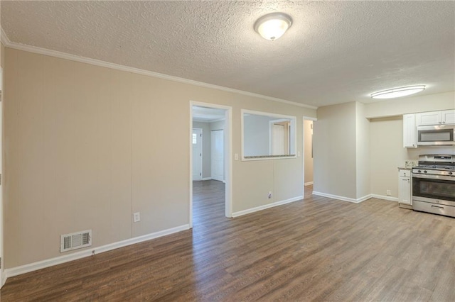 unfurnished living room with crown molding, light wood-type flooring, and a textured ceiling