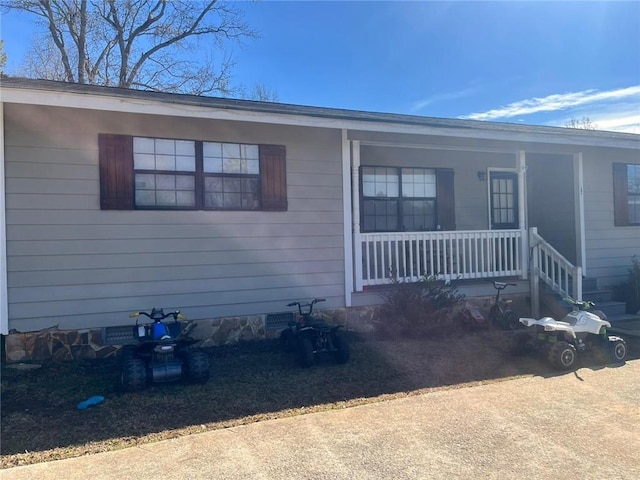 exterior space with a porch