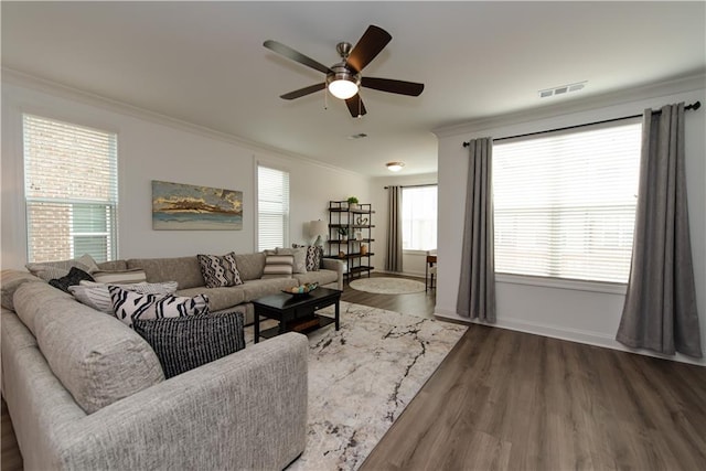 3195 Bartee Walk, Suwanee, GA 30024 - living room featuring crown molding, wood finished floors, a ceiling fan, and baseboards