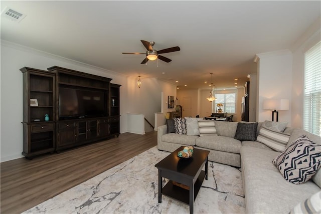 3195 Bartee Walk, Suwanee, GA 30024 - living room with wood finished floors, ceiling fan, ornamental molding, and recessed lighting