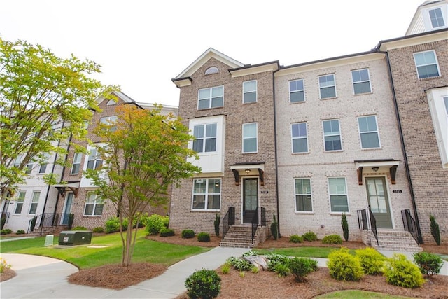 3195 Bartee Walk, Suwanee, GA 30024 - view of property featuring brick siding