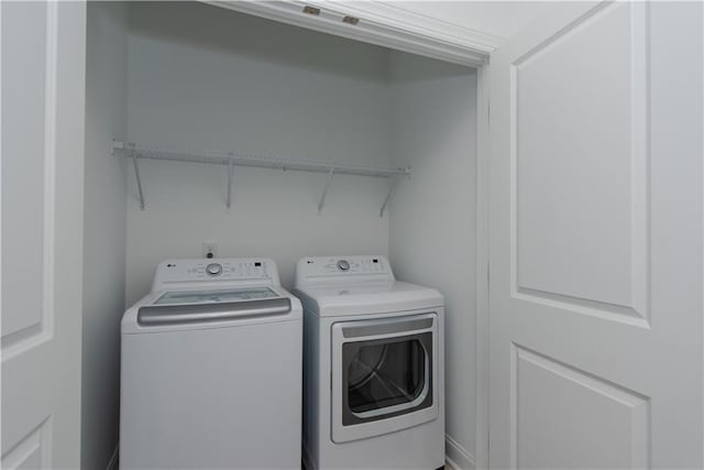 3195 Bartee Walk, Suwanee, GA 30024 - washroom with washing machine and dryer