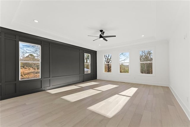 interior space featuring ceiling fan and light hardwood / wood-style floors