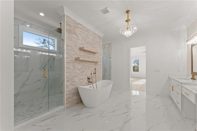 bathroom featuring vanity, ornamental molding, a chandelier, and plus walk in shower