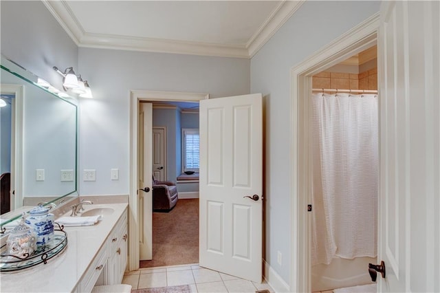 bathroom with tile patterned flooring, vanity, and crown molding