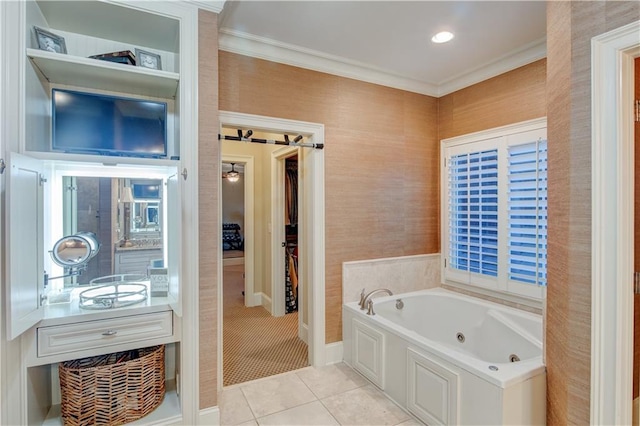 bathroom featuring tile patterned flooring, a bathtub, and ornamental molding