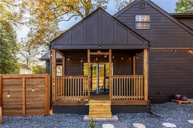 back of house with covered porch