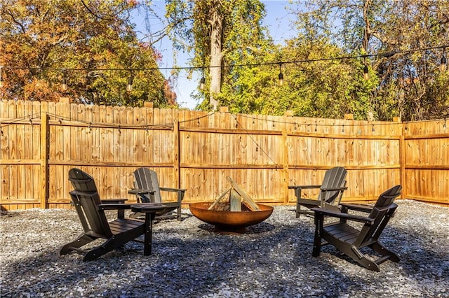 view of patio / terrace featuring a fire pit