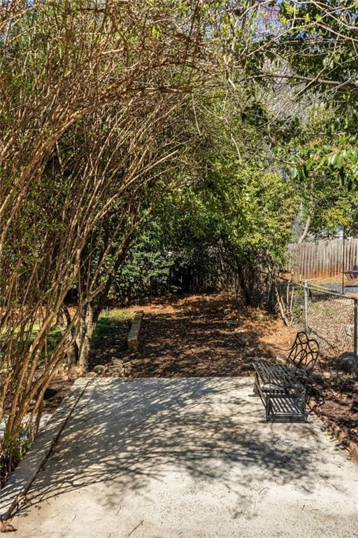 view of patio / terrace featuring fence