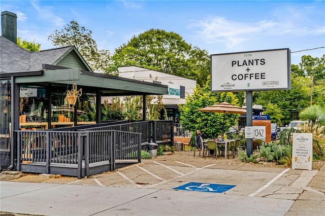 view of property's community with uncovered parking