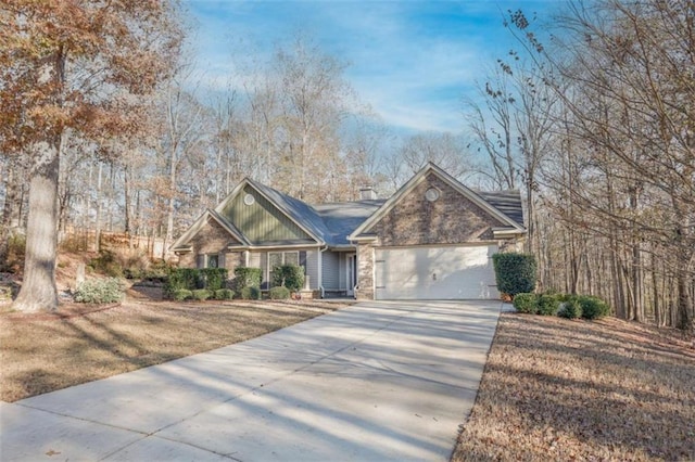 view of front facade with a garage and a front lawn