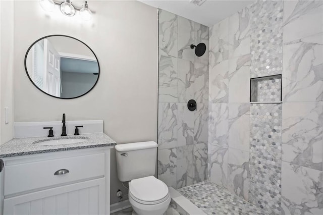 2478 Graywall St, East Point, GA 30344 - full bathroom with a marble finish shower, toilet, and vanity