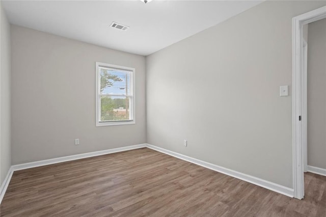 2478 Graywall St, East Point, GA 30344 - empty room featuring wood finished floors and baseboards