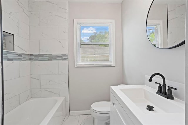 2478 Graywall St, East Point, GA 30344 - bathroom featuring marble finish floors, toilet, baseboards, vanity, and bathtub / shower combination