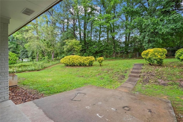 2478 Graywall St, East Point, GA 30344 - view of green lawn with a patio