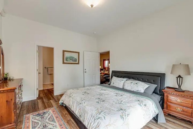 bedroom featuring hardwood / wood-style floors