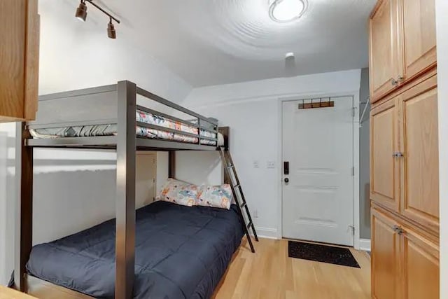 bedroom featuring light hardwood / wood-style flooring