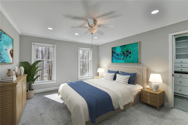 bedroom featuring crown molding, recessed lighting, baseboards, and carpet floors