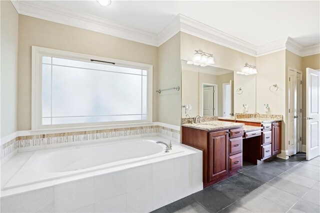 full bathroom featuring crown molding, double vanity, a wealth of natural light, a sink, and a bath