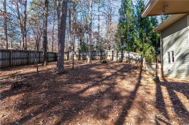 view of yard featuring a fenced backyard