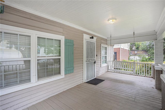 wooden deck featuring a porch