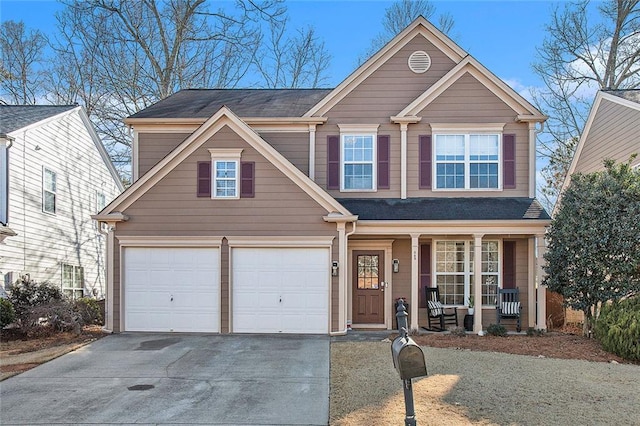 view of front of house featuring a garage and covered porch