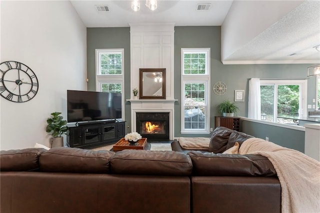 475 Chippenham Ct, Alpharetta, GA 30005 - living area with plenty of natural light and a fireplace