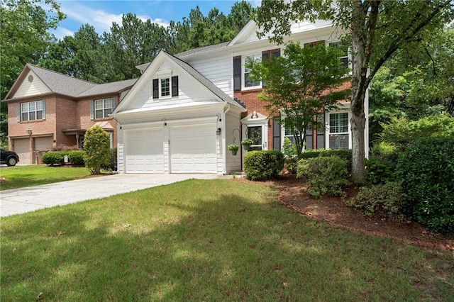 475 Chippenham Ct, Alpharetta, GA 30005 - view of front of house featuring concrete driveway, a front lawn, and a garage
