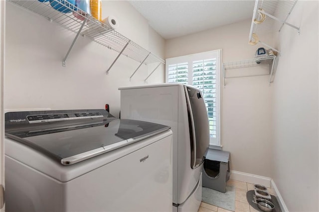 475 Chippenham Ct, Alpharetta, GA 30005 - washroom with washing machine and clothes dryer and light tile patterned floors
