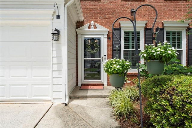 475 Chippenham Ct, Alpharetta, GA 30005 - doorway to property featuring a garage and concrete driveway